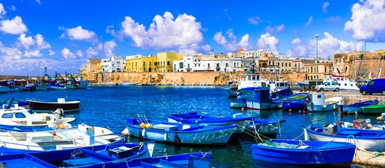 Puglia, south of Italy. Panorama of beautiful coastal medieval town Gallipoli.